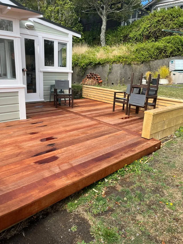 Timber deck with a raised timber edge, seen from the lawn